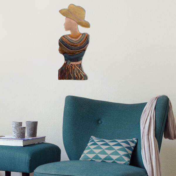 Cowgirl copper wall decor by Metal Memories over chair