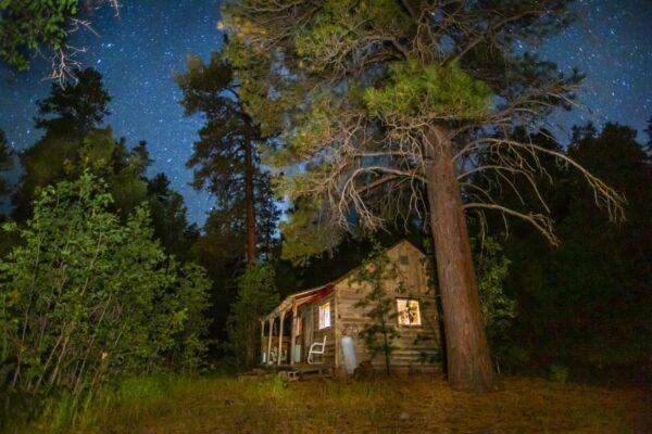 Cabin at Night by Byron Neslen Photography