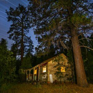 Cabin with Star Trails by Byron Neslen Photography