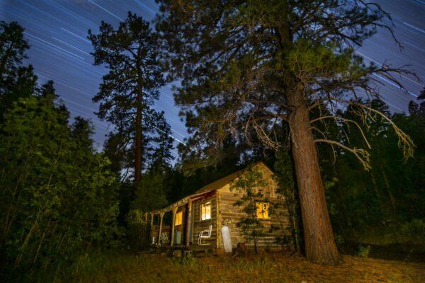 Cabin with Star Trails by Byron Neslen Photography